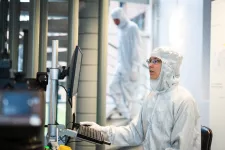 Photo of a person in the cleanroom.